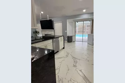 7736 Rollingridge Court, Orlando, FL 32835 - Photo 9