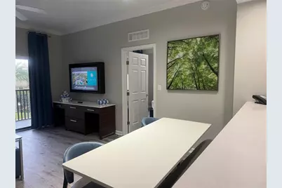 14501 Grove Resort Avenue #1203, Winter Garden, FL 34787 - Photo 3