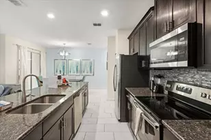 9075 Dogleg Dr, Champions Gate, FL 33896 - Photo 9