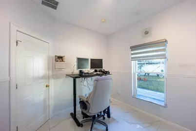 8915 Victoria Isle Place, Orlando, FL 32829 - Photo 25