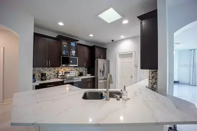 8915 Victoria Isle Place, Orlando, FL 32829 - Photo 15