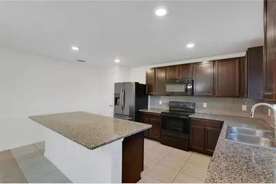 13916 Rushing Creek Run, Orlando, FL 32824 - Photo 9