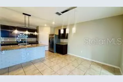 5636 Blowing Wind Place, Saint Cloud, FL 34771 - Photo 5