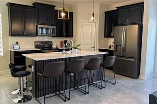 1055 Blackwolf Run Rd, Champions Gate, FL 33896 - Photo 5