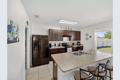 885 Freedom Boulevard, Davenport, FL 33837 - Photo 9