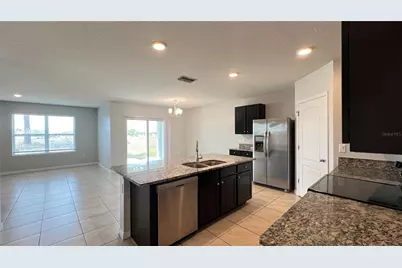 2440 White Poppy Drive, Kissimmee, FL 34747 - Photo 19