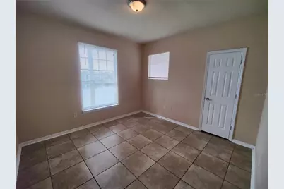 3737 Castle Pines Lane #4424, Orlando, FL 32839 - Photo 13