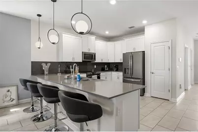 917 Ocean Course Avenue, Champions Gate, FL 33896 - Photo 35