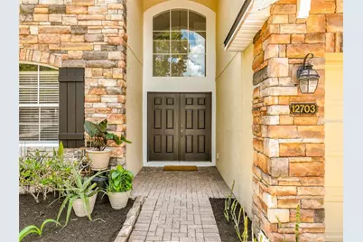 12703 Moss Park Ridge Drive, Orlando, FL 32832 - Photo 5
