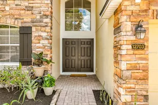 12703 Moss Park Ridge Dr, Orlando, FL 32832 - Photo 5