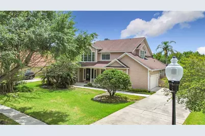 3880 Hunters Isle Drive, Orlando, FL 32837 - Photo 1