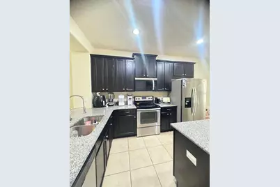 2515 Nouveau Way, Kissimmee, FL 34741 - Photo 9