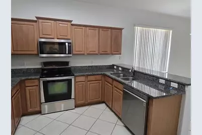 8423 Baywood Vista Drive, Orlando, FL 32810 - Photo 11
