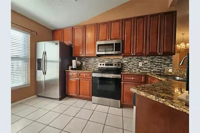 1239 Carey Glen Circle, Orlando, FL 32824 - Photo 9