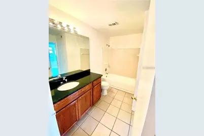 6076 Westgate Drive #104, Orlando, FL 32835 - Photo 7