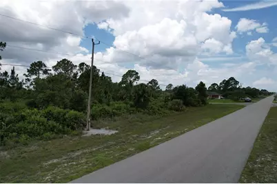 1056 Jaguar Boulevard, Lehigh Acres, FL 33974 - Photo 3