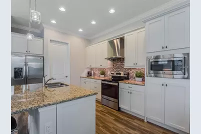 9097 Smithies Street, Orlando, FL 32827 - Photo 11