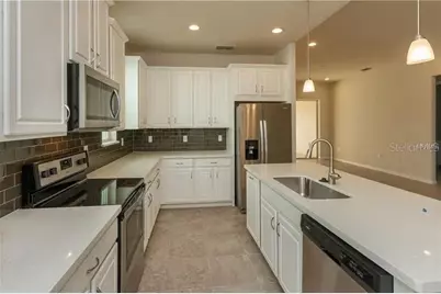 2508 Nouveau Way, Kissimmee, FL 34741 - Photo 9