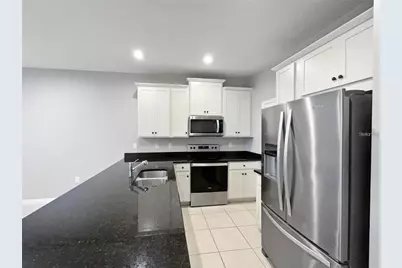 2424 Blowing Breeze Avenue, Kissimmee, FL 34744 - Photo 11