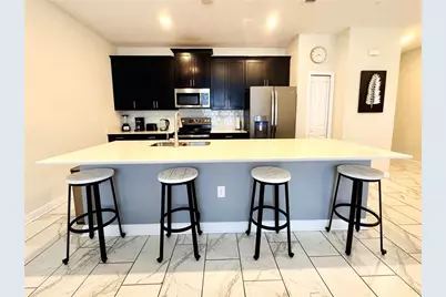 1555 Sandbagger Drive, Champions Gate, FL 33896 - Photo 9