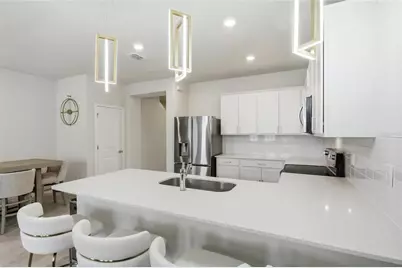 6942 Reverie Park Avenue, Orlando, FL 32829 - Photo 13