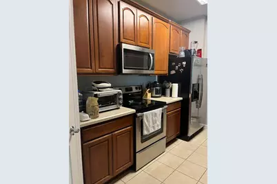 3326 Robert Trent Jones Drive #31002, Orlando, FL 32835 - Photo 3