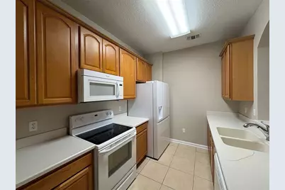 3314 Robert Trent Jones Drive #406, Orlando, FL 32835 - Photo 11