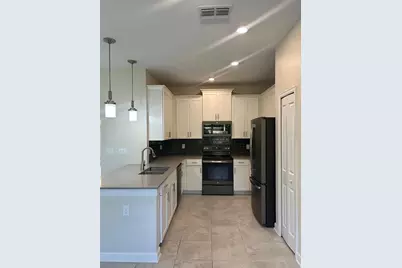 11576 Whistling Pine Way, Orlando, FL 32832 - Photo 5