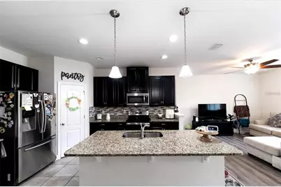 2749 Pleasant Cypress Circle, Kissimmee, FL 34741 - Photo 3