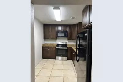 4184 Versailles Drive #4184D, Orlando, FL 32808 - Photo 5
