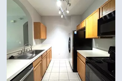 8660 Buccilli Drive #305, Orlando, FL 32829 - Photo 7
