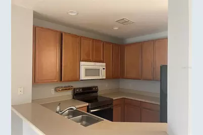 9385 Jasmine Flower Lane #167, Orlando, FL 32832 - Photo 15
