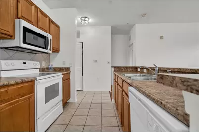 6171 Metrowest Boulevard #107, Orlando, FL 32835 - Photo 11