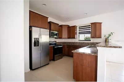 1797 Portofino Meadows Boulevard, Orlando, FL 32824 - Photo 3