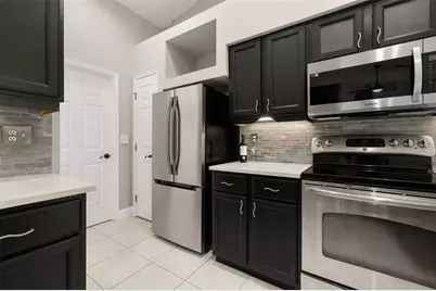 7918 Lakeside Woods Drive, Orlando, FL 32810 - Photo 9