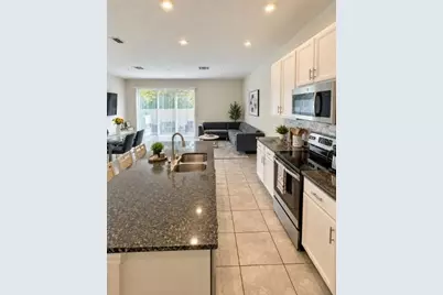 10805 Wyne Tree Court, Orlando, FL 32824 - Photo 13
