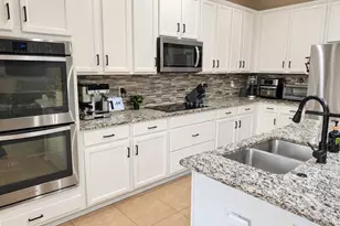 1119 Fountain Coin Loop, Orlando, FL 32828 - Photo 7