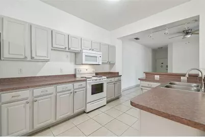 5052 Sunridge Palms Drive #102, Tampa, FL 33617 - Photo 13