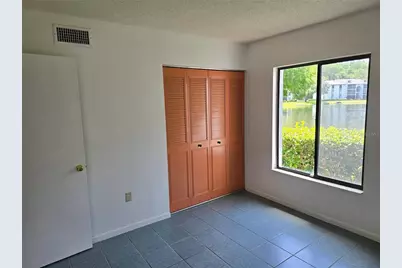 1281 Pine Ridge Circle E #B1, Tarpon Springs, FL 34688 - Photo 15