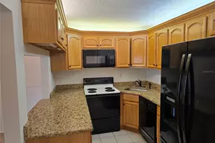 1281 Pine Ridge Cir E, Tarpon Springs, FL 34688 - Photo 19