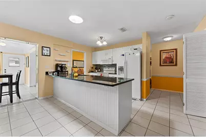 945 Winding Oaks Drive, Palm Harbor, FL 34683 - Photo 13