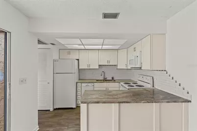 1163 Orange Tree Circle W #D, Palm Harbor, FL 34684 - Photo 23