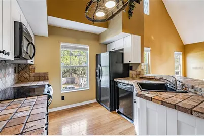 9156 Lake Chase Island Way #9156, Tampa, FL 33626 - Photo 7