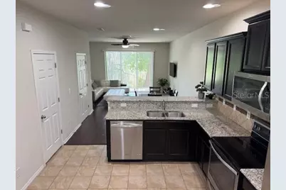 8723 Turnstone Haven Place, Tampa, FL 33619 - Photo 5