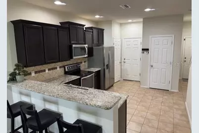 8723 Turnstone Haven Place, Tampa, FL 33619 - Photo 3