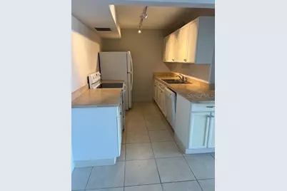 10355 Paradise Boulevard #114, Treasure Island, FL 33706 - Photo 3