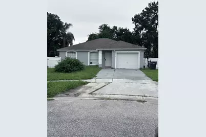 6934 Wildwood Oak Drive, Tampa, FL 33617 - Photo 1