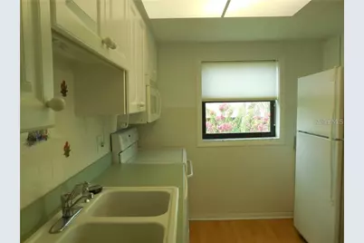 1 Windrush Boulevard #28, Indian Rocks Beach, FL 33785 - Photo 3