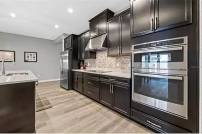 7063 Talamore Drive, Wesley Chapel, FL 33545 - Photo 13