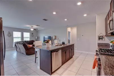 9805 Alysheba Court, Sun City Center, FL 33573 - Photo 11